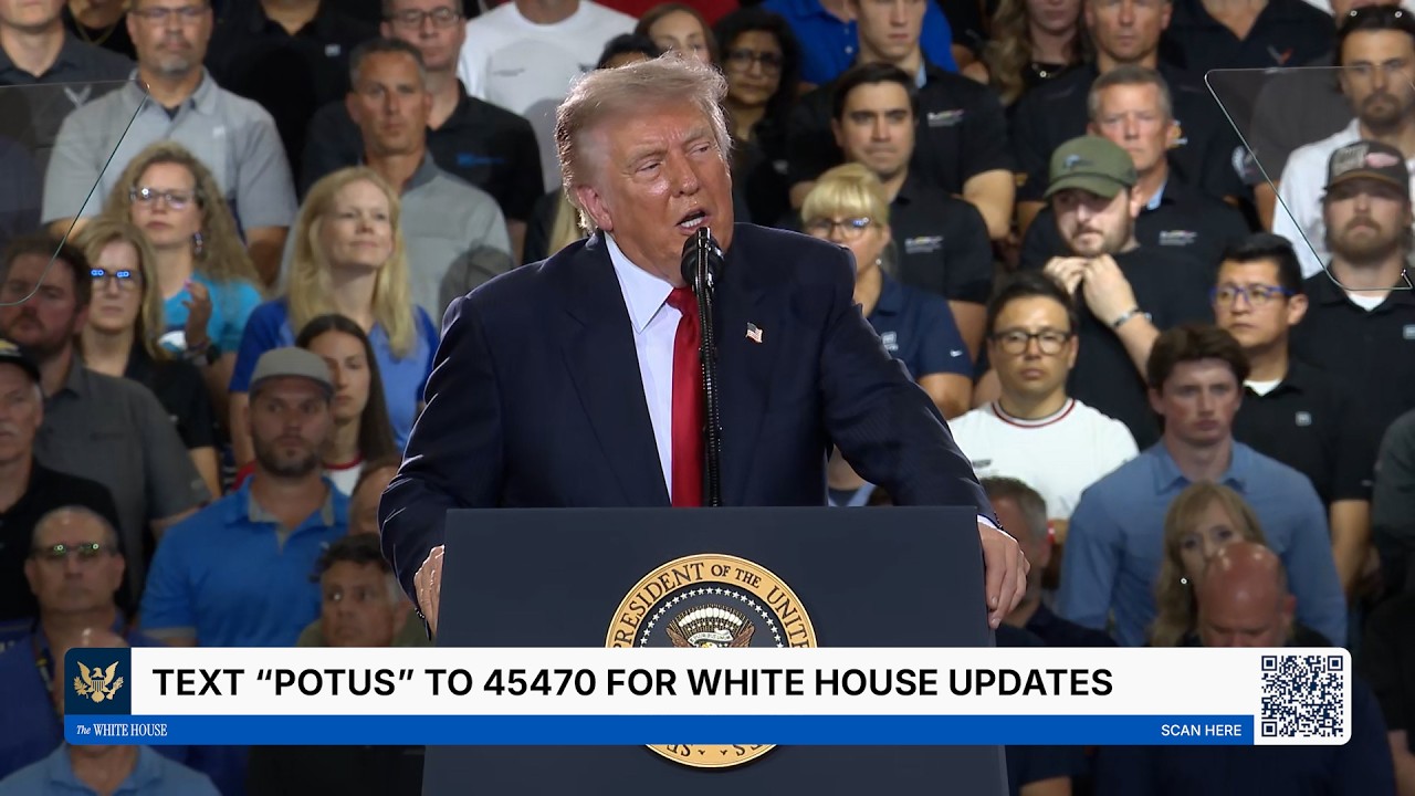 President Donald Trump speaks behind a presidential lectern at a General Motors facility in Michigan.